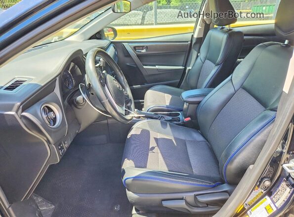 2T1BURHE5KC157744 2019 TOYOTA COROLLA Синий Вид салона спереди