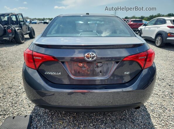 2T1BURHE5KC159607 2019 TOYOTA COROLLA Black Vista trasera