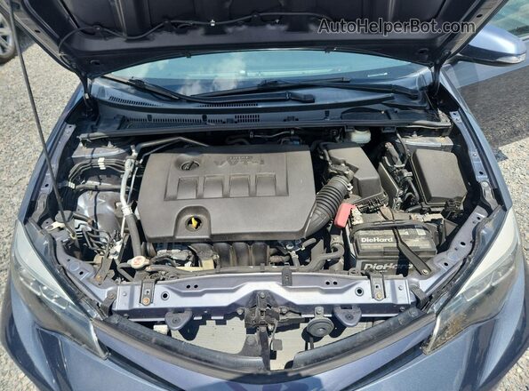 2T1BURHE5KC159607 2019 TOYOTA COROLLA Black Vista interior trasera