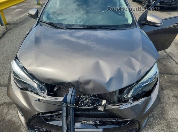 2T1BURHE6HC755866 2017 TOYOTA COROLLA Brown Widok wnętrza z tyłu
