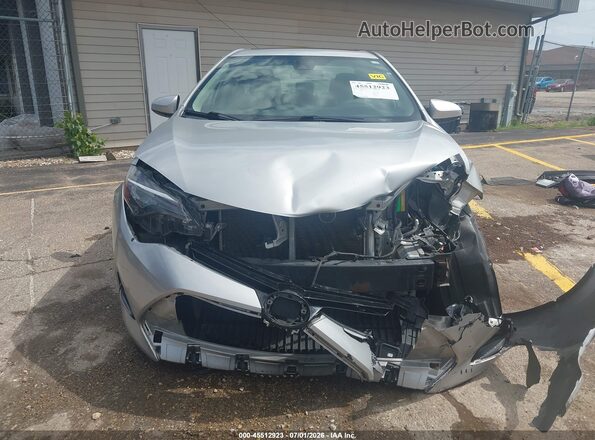 2T1BURHE6HC804239 2017 TOYOTA COROLLA Silver Widok wnętrza z tyłu