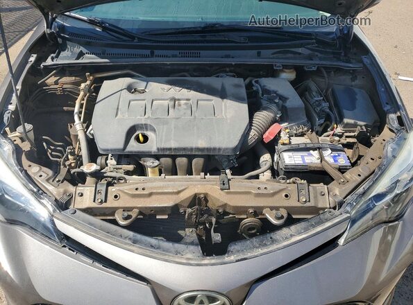 2T1BURHE6HC864456 2017 TOYOTA COROLLA Бежевый Вид задней части салона