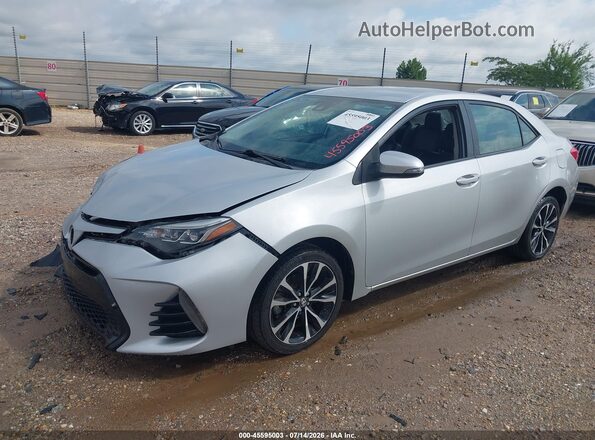 2T1BURHE6HC886599 2017 TOYOTA COROLLA Серебряный Передняя левая четверть