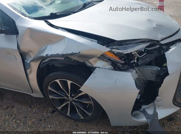2T1BURHE6HC886599 2017 TOYOTA COROLLA Серебряный Вид спереди