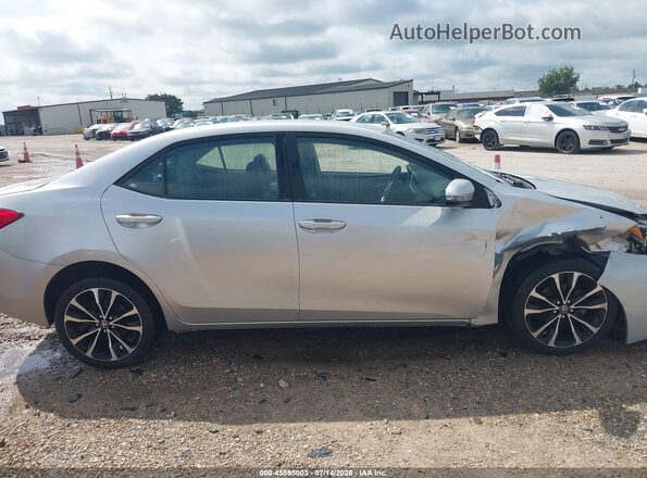2T1BURHE6HC886599 2017 TOYOTA COROLLA Серебряный Вид задней части салона