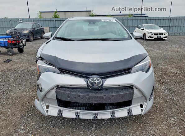 2T1BURHE6JC041385 2018 TOYOTA COROLLA Silver Widok z przodu