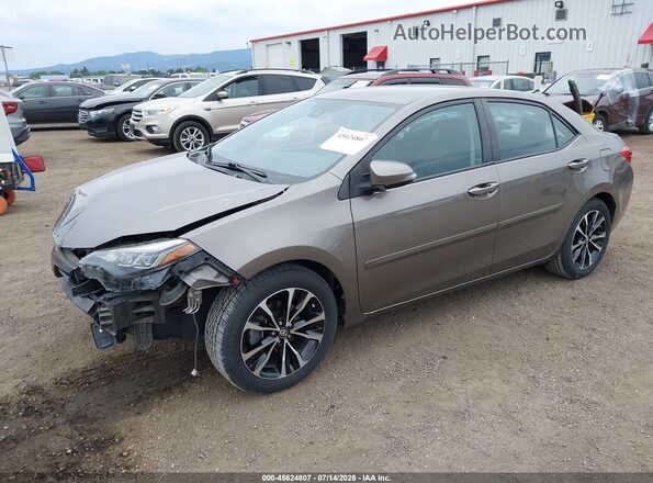 2T1BURHE6JC048403 2018 TOYOTA COROLLA Gray Vista tres cuartos delantera izquierda