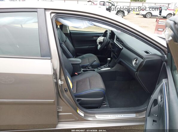2T1BURHE6JC048403 2018 TOYOTA COROLLA Gray Vista interior delantera