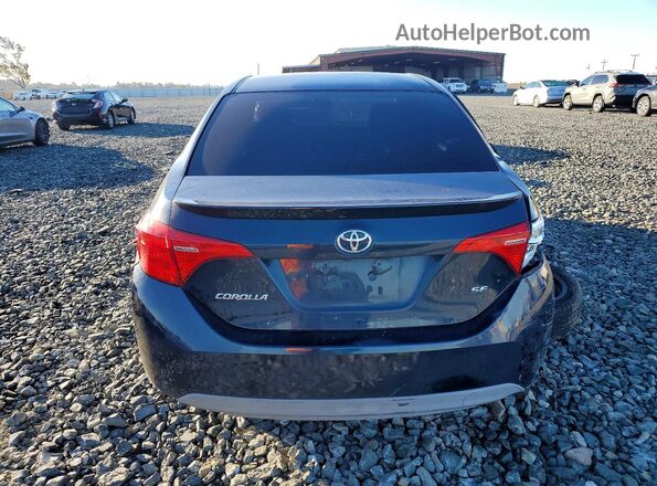 2T1BURHE6JC071471 2018 TOYOTA COROLLA Teal Rear view