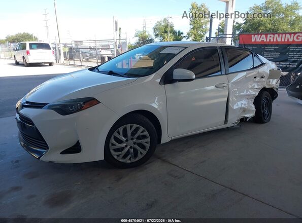2T1BURHE6JC081983 2018 TOYOTA COROLLA White Vista tres cuartos delantera izquierda