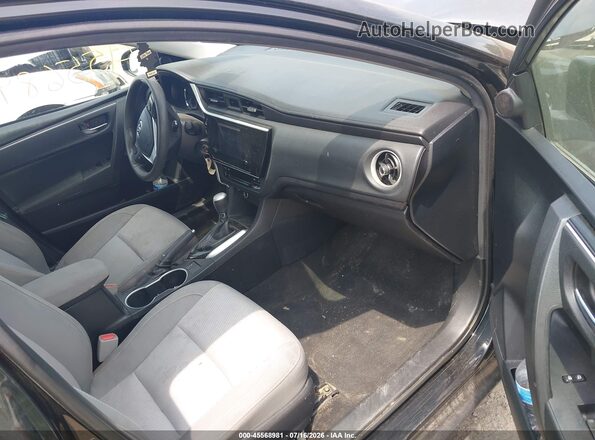 2T1BURHE6JC083068 2018 TOYOTA COROLLA Черный Вид салона спереди