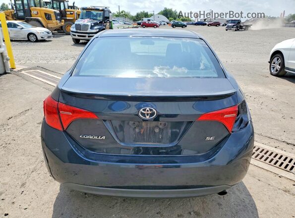 2T1BURHE6JC097309 2018 TOYOTA COROLLA Синий Вид сзади