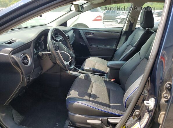 2T1BURHE6JC097309 2018 TOYOTA COROLLA Синий Вид салона спереди