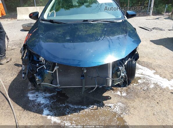2T1BURHE6JC978737 2018 TOYOTA COROLLA Blue Widok z przodu