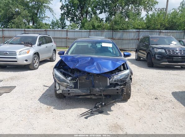 2T1BURHE6KC162998 2019 TOYOTA COROLLA Синий Вид задней части салона