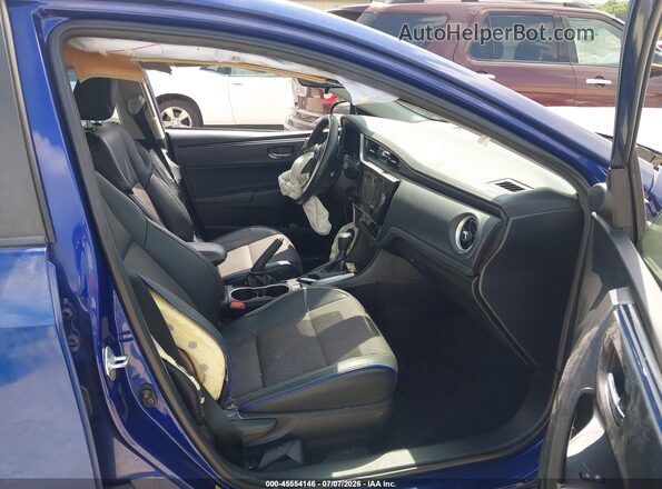 2T1BURHE6KC162998 2019 TOYOTA COROLLA Синий Вид салона спереди