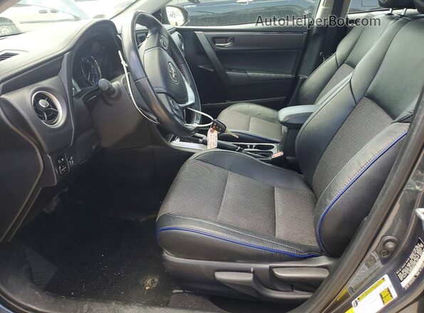 2T1BURHE6KC166744 2019 TOYOTA COROLLA Charcoal Widok wnętrza z przodu