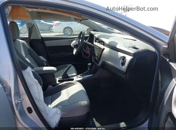 2T1BURHE6KC207051 2019 TOYOTA COROLLA Silver Widok wnętrza z przodu