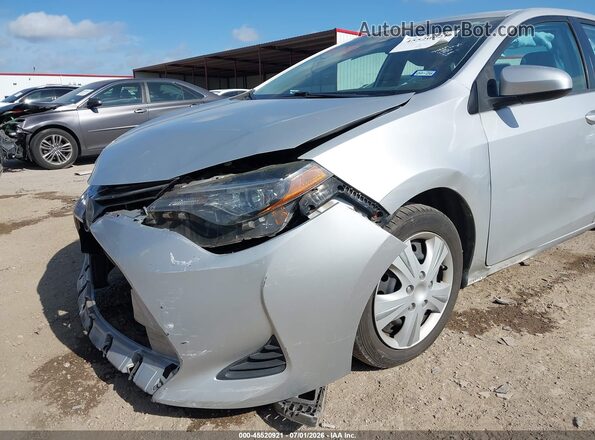 2T1BURHE6KC207051 2019 TOYOTA COROLLA Silver Widok z przodu