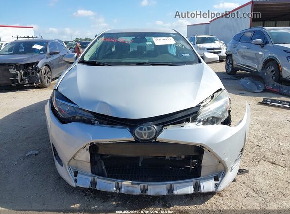 2T1BURHE6KC207051 2019 TOYOTA COROLLA Silver Widok wnętrza z tyłu