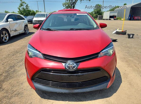 2T1BURHE6KC240082 2019 TOYOTA COROLLA Red Front view
