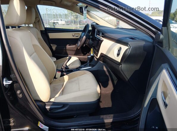 2T1BURHE7HC754239 2017 TOYOTA COROLLA Black Front interior view