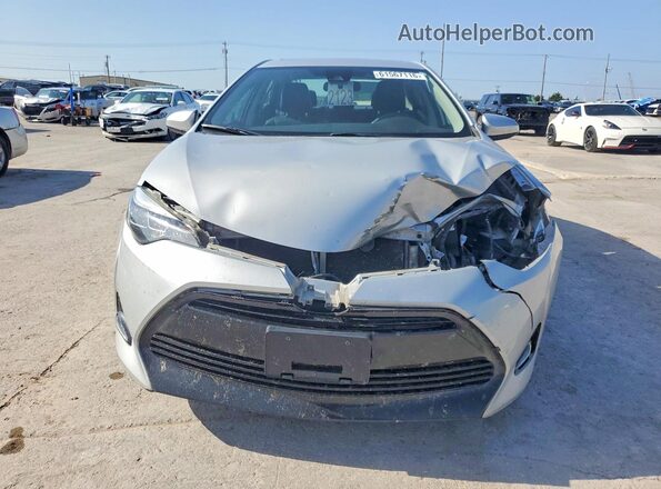 2T1BURHE7HC756556 2017 TOYOTA COROLLA Серебряный Вид спереди