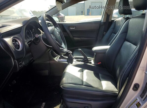2T1BURHE7HC756556 2017 TOYOTA COROLLA Серебряный Вид салона спереди