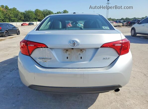 2T1BURHE7HC756556 2017 TOYOTA COROLLA Серебряный Вид сзади