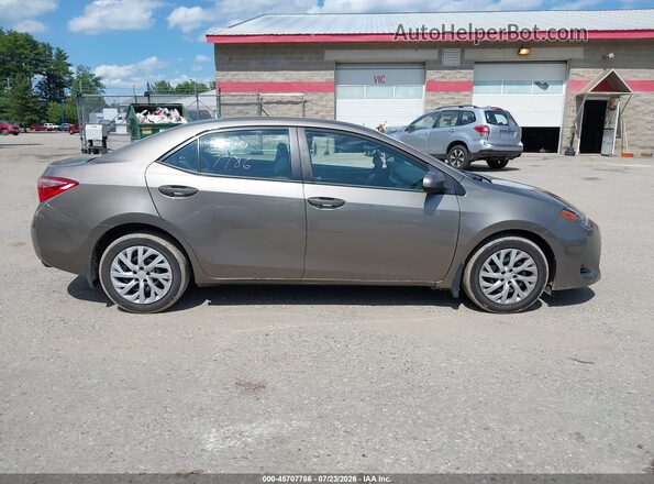 2T1BURHE7HC802273 2017 TOYOTA COROLLA Коричневый Вид задней части салона