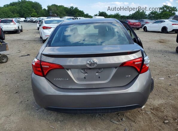 2T1BURHE7HC913115 2017 TOYOTA COROLLA Tan Вид ззаду