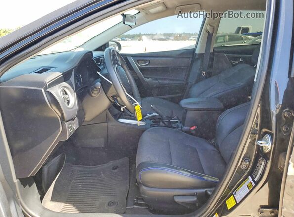 2T1BURHE7HC935759 2017 TOYOTA COROLLA Черный Вид салона спереди