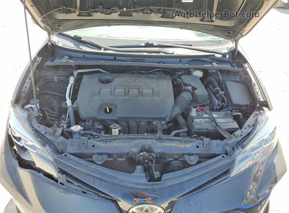 2T1BURHE7HC935759 2017 TOYOTA COROLLA Черный Вид задней части салона