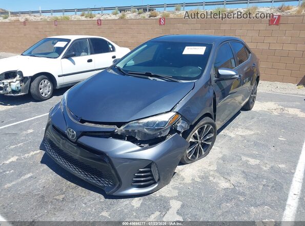 2T1BURHE7HC942615 2017 TOYOTA COROLLA Gray Vista tres cuartos delantera izquierda