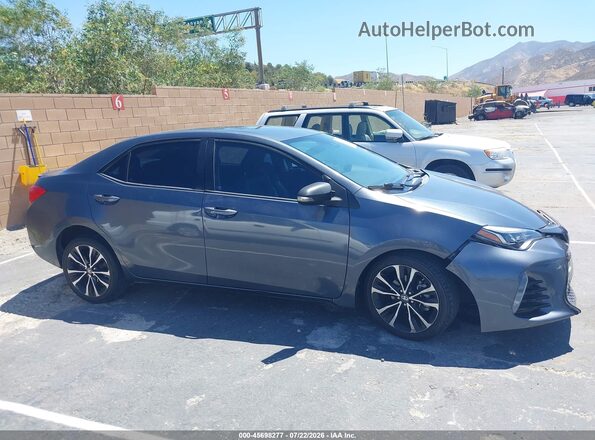 2T1BURHE7HC942615 2017 TOYOTA COROLLA Gray Vista interior trasera