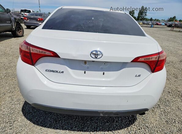2T1BURHE7JC069731 2018 TOYOTA COROLLA White Rear view