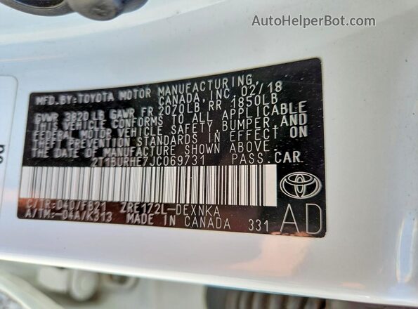 2T1BURHE7JC069731 2018 TOYOTA COROLLA White VIN sticker view