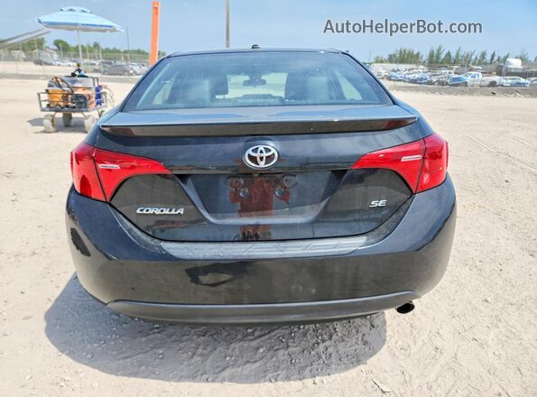2T1BURHE7JC076470 2018 TOYOTA COROLLA Black Vista trasera