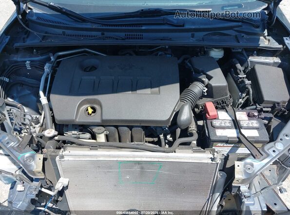 2T1BURHE7JC971232 2018 TOYOTA COROLLA Gray Widok z tyłu