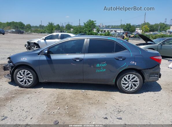 2T1BURHE7JC971232 2018 TOYOTA COROLLA Gray Widok wnętrza z tyłu