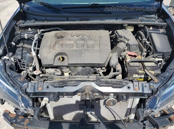 2T1BURHE7JC978519 2018 TOYOTA COROLLA Black Widok wnętrza z tyłu