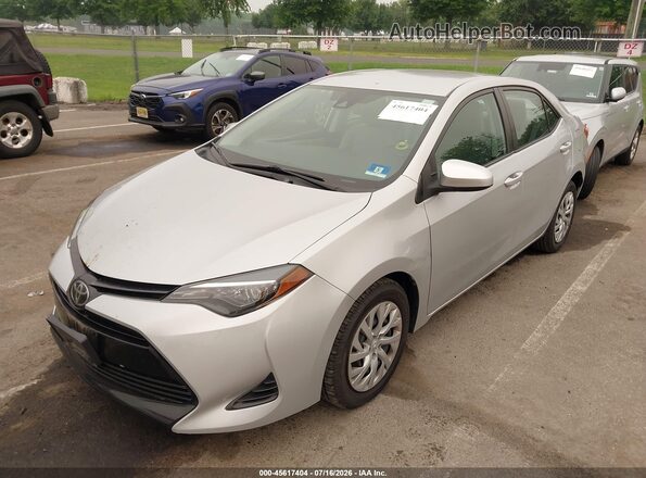2T1BURHE7JC981551 2018 TOYOTA COROLLA Silver Առջևի ձախ երեք քառորդ տեսարան