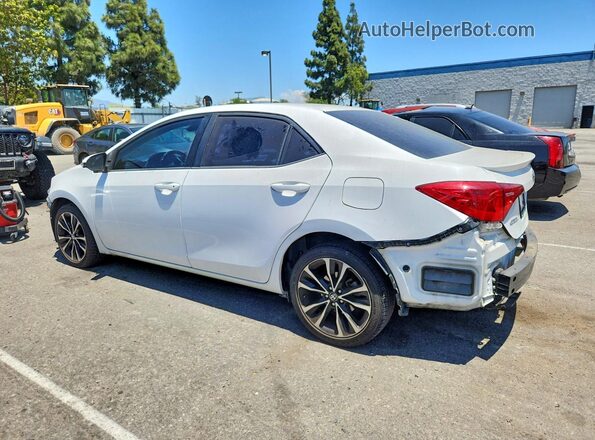 2T1BURHE7KC125667 2019 TOYOTA COROLLA White Trasero izquierdo