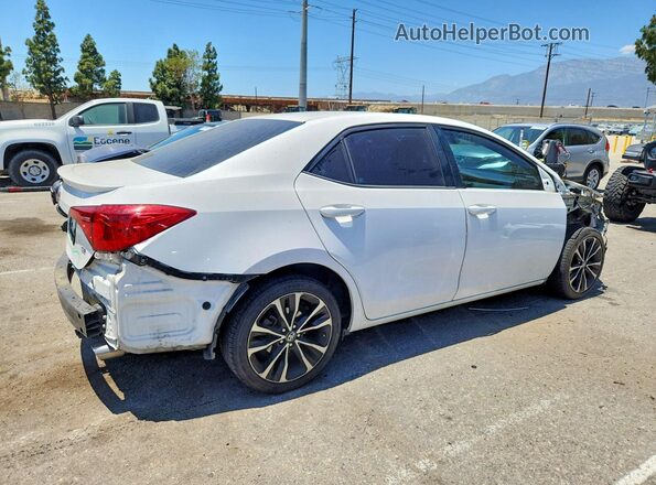 2T1BURHE7KC125667 2019 TOYOTA COROLLA White Trasero derecho