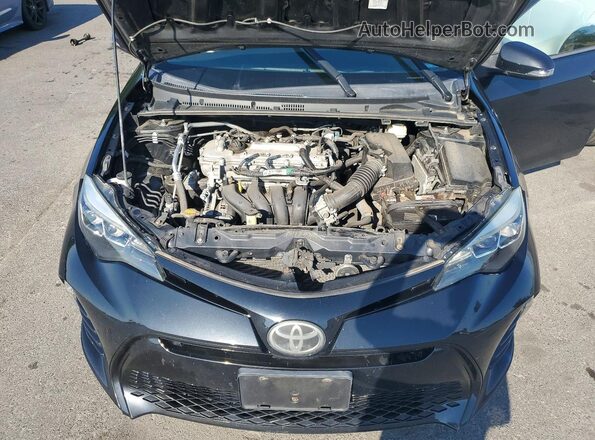 2T1BURHE8HC750166 2017 TOYOTA COROLLA Black Սալոնի հետևի տեսք