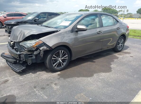 2T1BURHE8HC754279 2017 TOYOTA COROLLA Gray Vista tres cuartos delantera izquierda