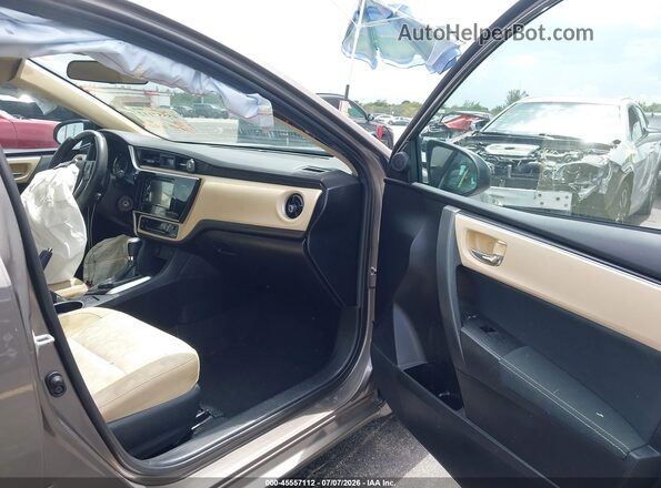 2T1BURHE8HC754279 2017 TOYOTA COROLLA Gray Vista interior delantera