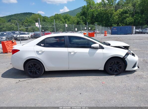 2T1BURHE8HC767209 2017 TOYOTA COROLLA White Widok wnętrza z tyłu