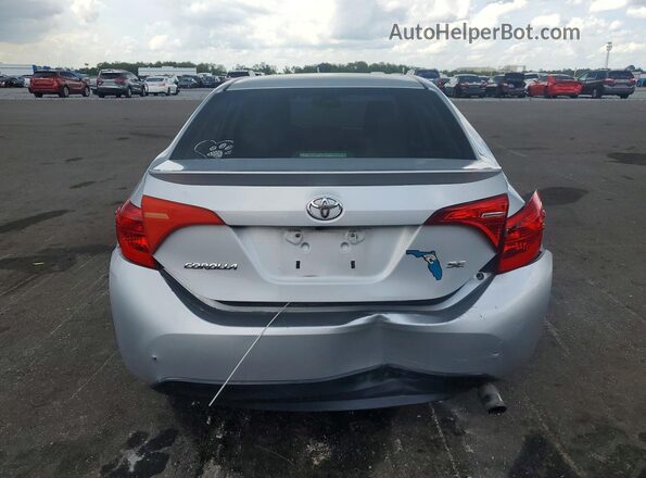 2T1BURHE8HC787363 2017 TOYOTA COROLLA Gray Rear view