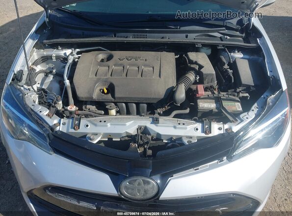2T1BURHE8JC024796 2018 TOYOTA COROLLA Silver Vista trasera